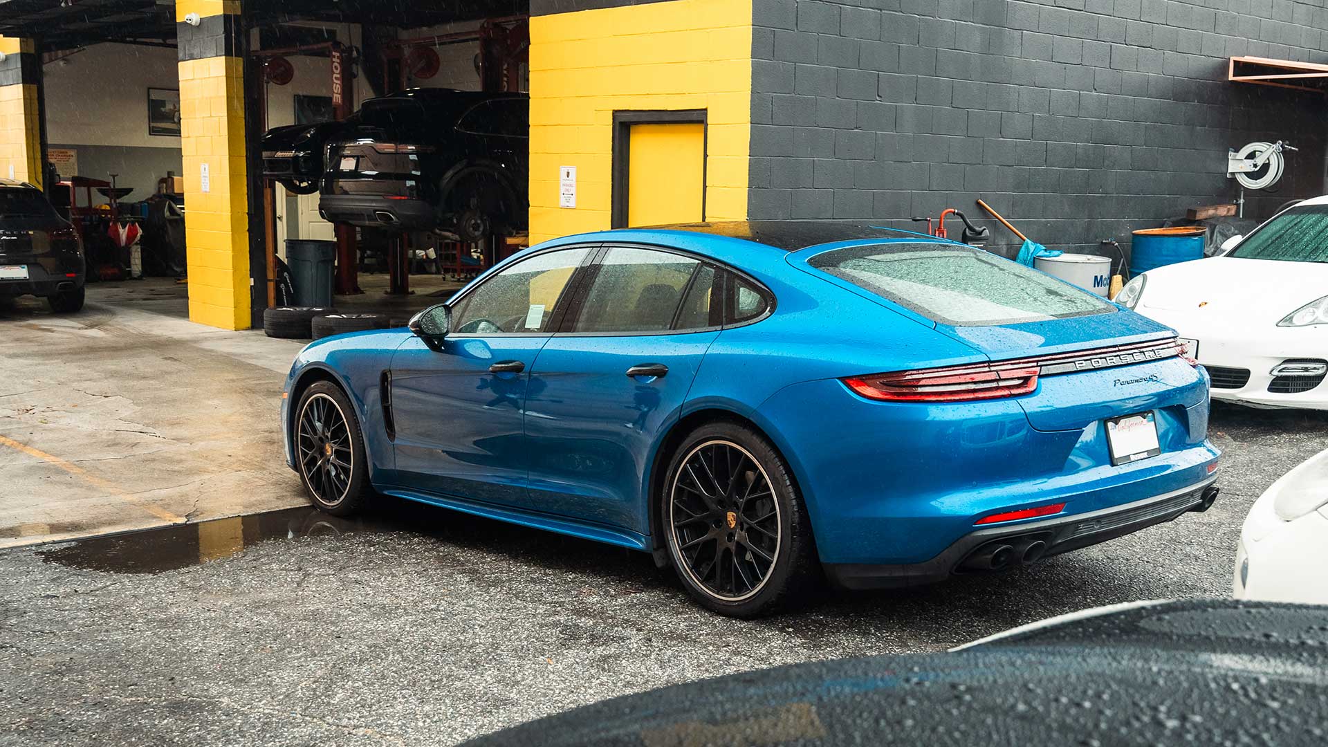 blue porsche panamera at house pasadena