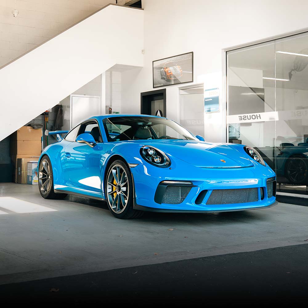 blue porsche 911 991 gt3 at house automotive porsche service center