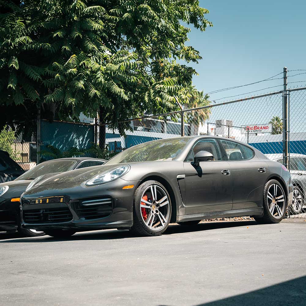 gray porsche panamera at house encino