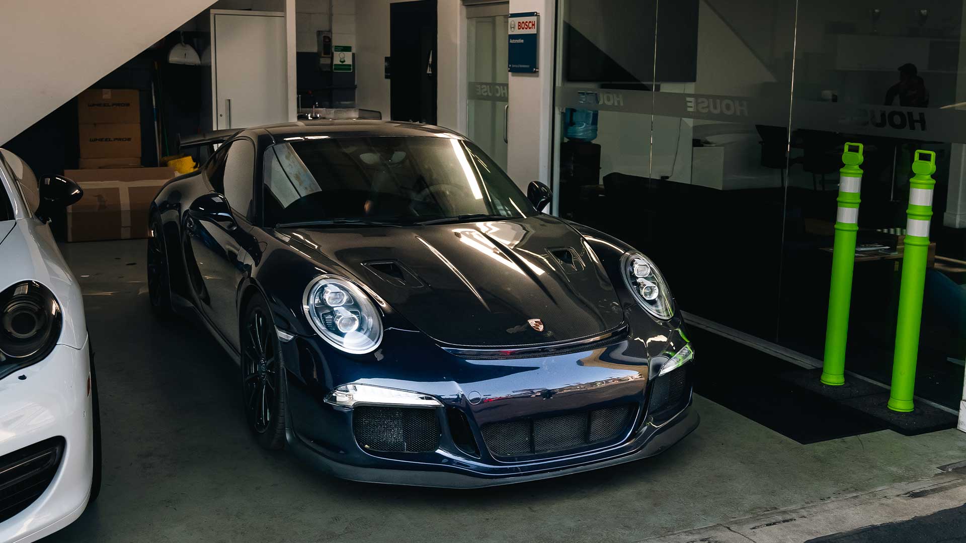 porsche 911 gt3 in professional garage for buyers guide inspection and evaluation