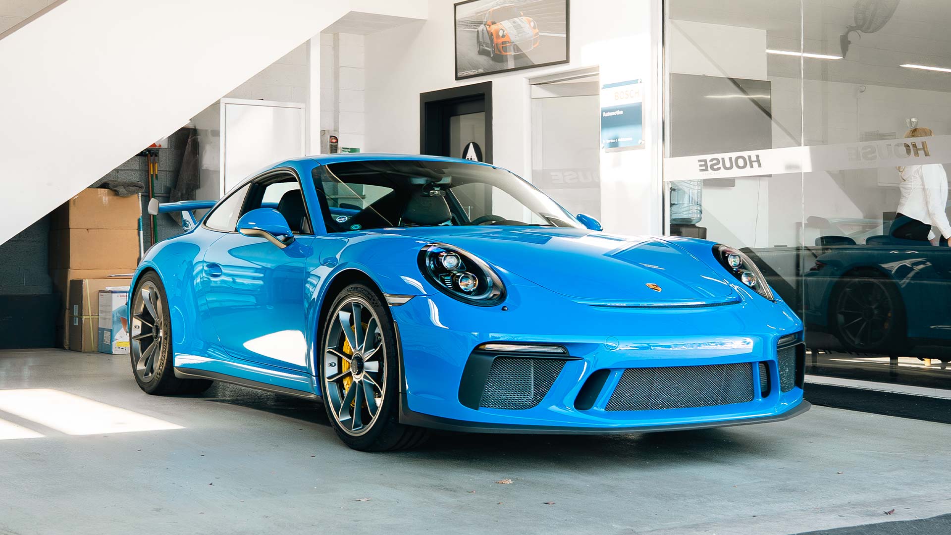 blue porsche 911 991 gt3 at house automotive porsche service center