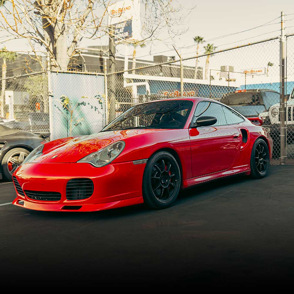 red porsche 911 turbo with modifications showcasing performance options for buyers guide