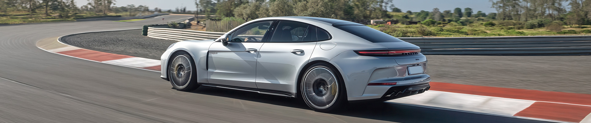 silver porsche panamera 976 on track