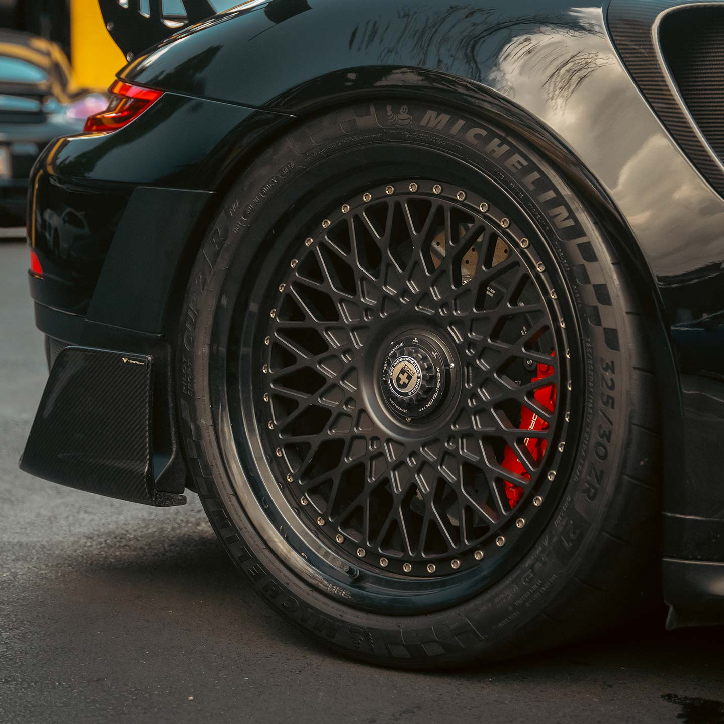 black porsche gt2 rs with michelin tires and hre wheels