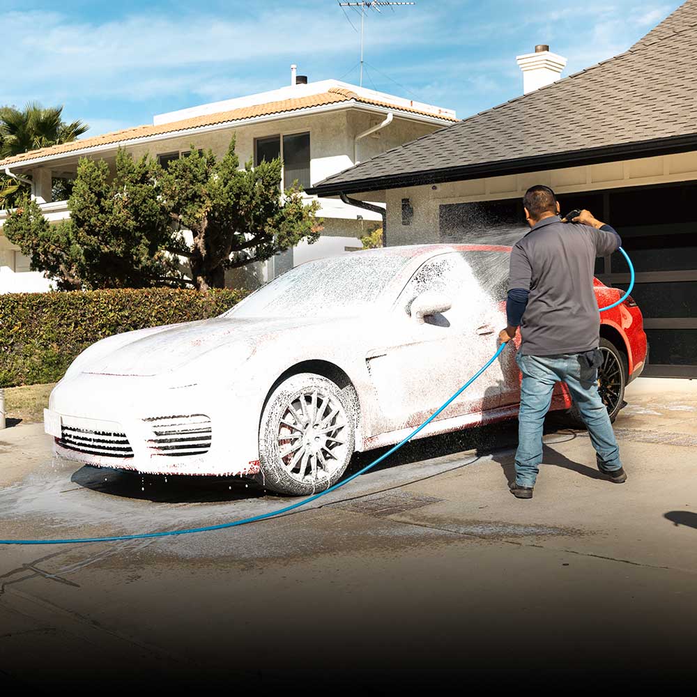 washos detailer washing customer porsche panamera after service at their house