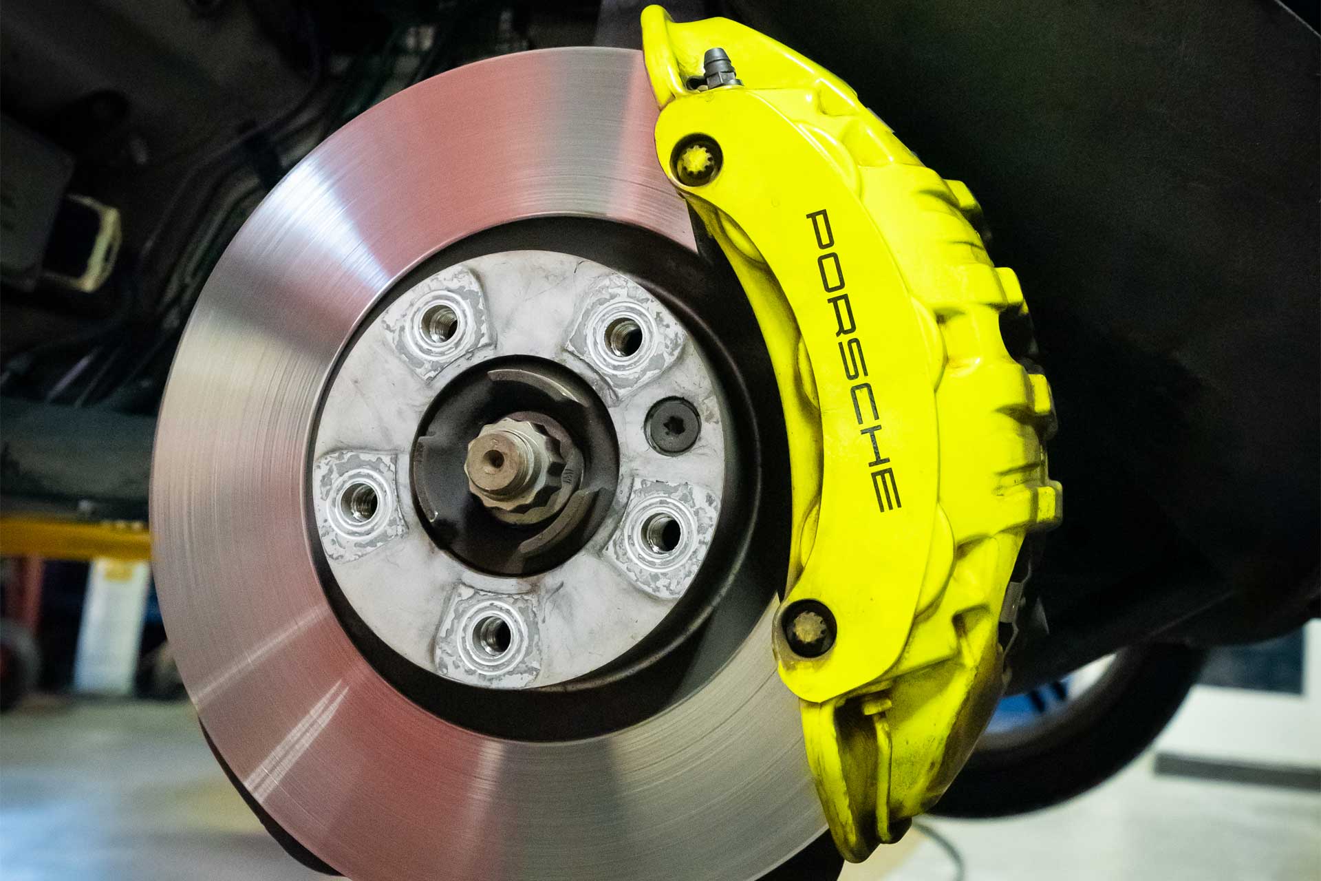 yellow porsche brake calipers