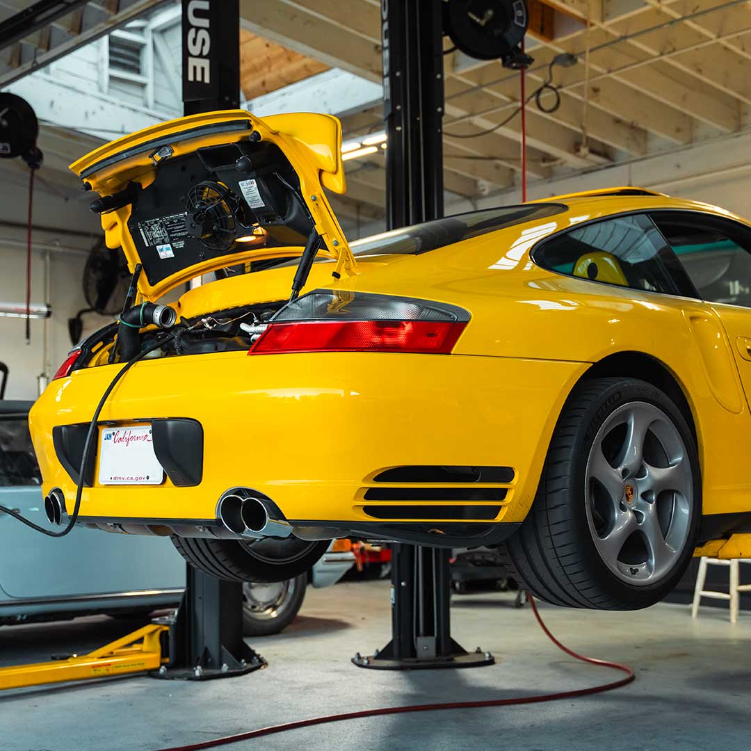 yellow porsche 996 ims bearing at house auto